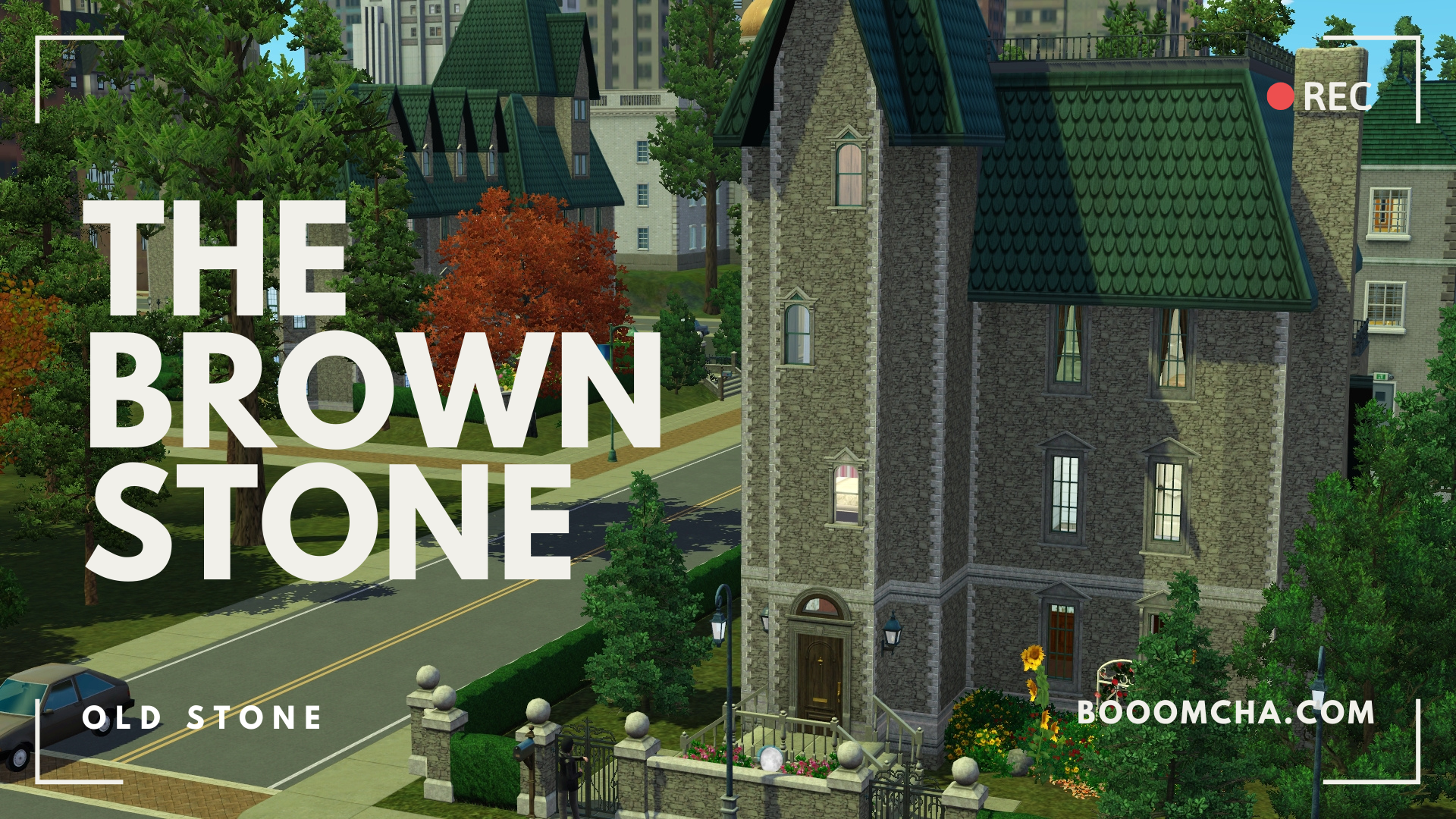 A detailed view of a brownstone building with a green roof, surrounded by trees and colorful landscaping, featuring a well-maintained front yard and street.