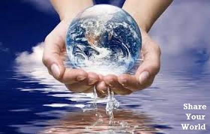 Two hands holding a glass globe representing Earth over a reflective water surface, with the phrase 'Share Your World' in the bottom right corner.